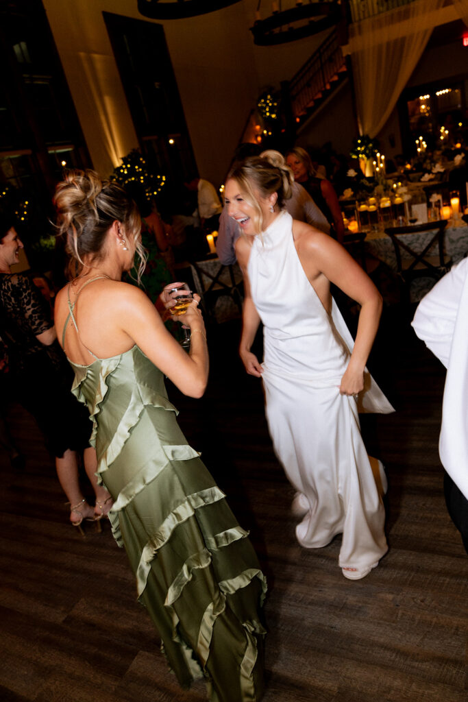 bride and her friends dancing at the reception party