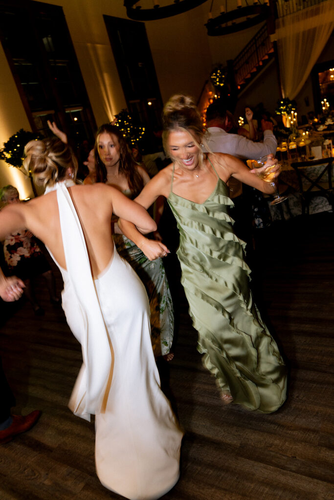 bride and her guests dancing 