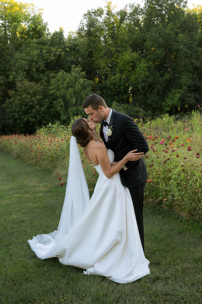 portrait of the bride and groom kissing during their bridal portraits 