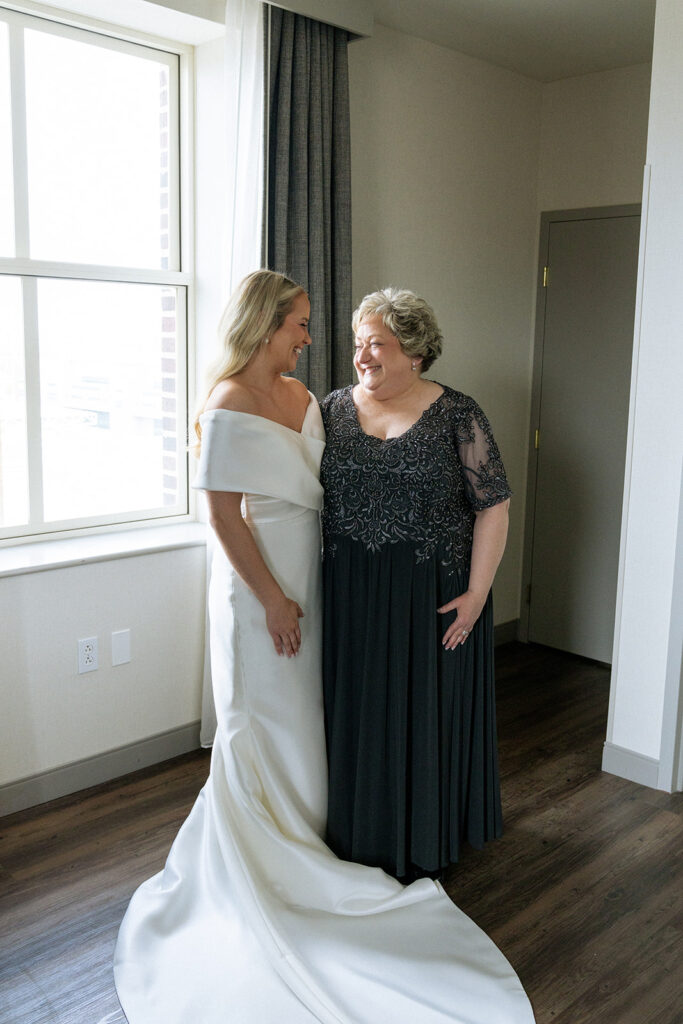 cute picture of the bride and her mom at the catholic st. louis wedding