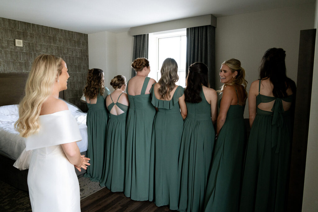 bride and bridesmaids first look