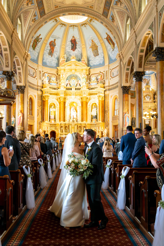 newlyweds kissing