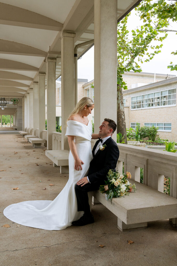 couple looking at each other during their photoshoot before heading to the reception