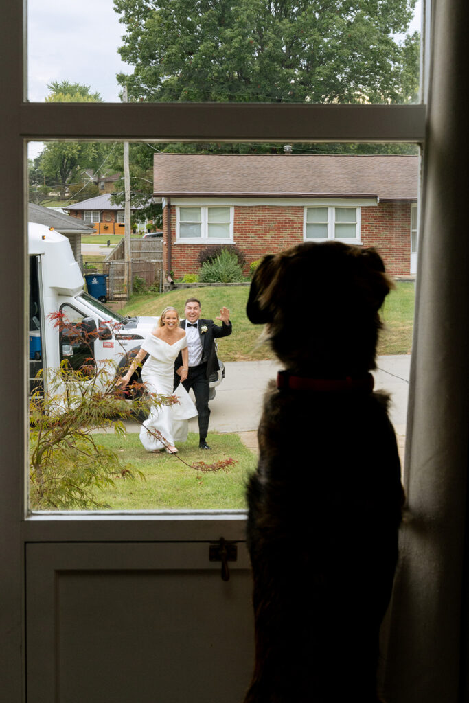 cute picture of the newlyweds and their dog 