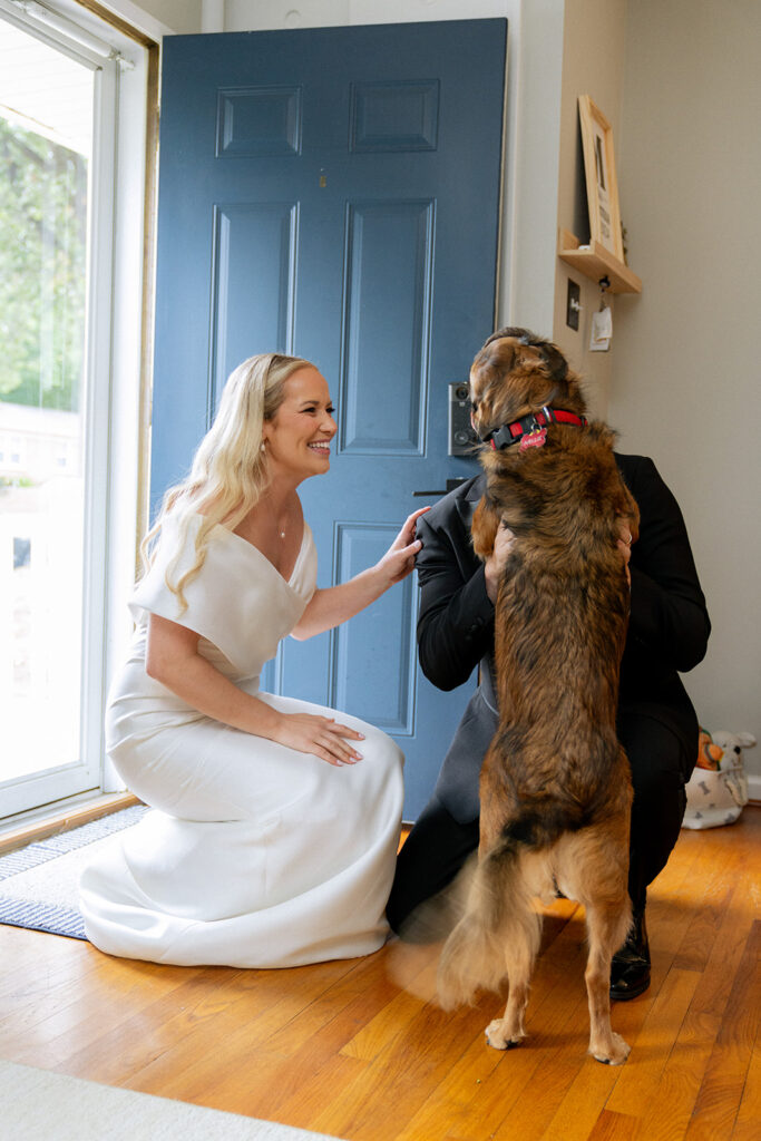 cute picture of the newlyweds and their dog 