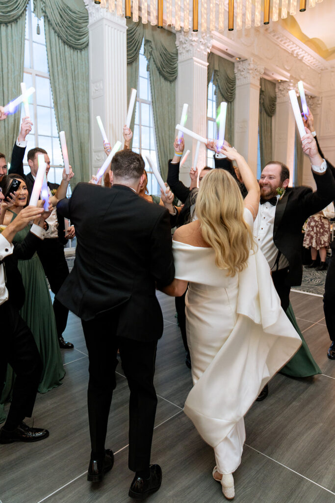 happy couple entering their reception