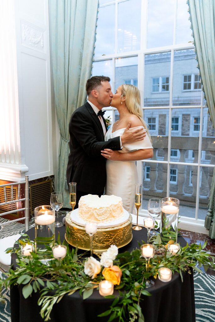 couple kissing at their reception