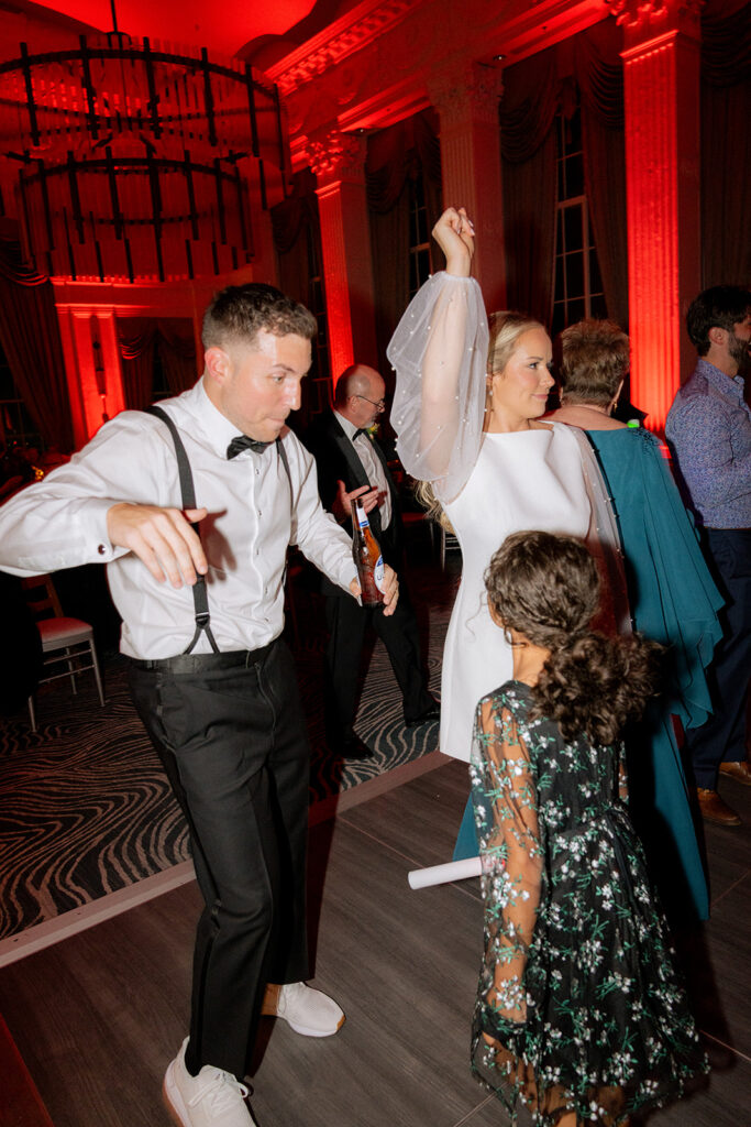 groom dancing at his wedding party