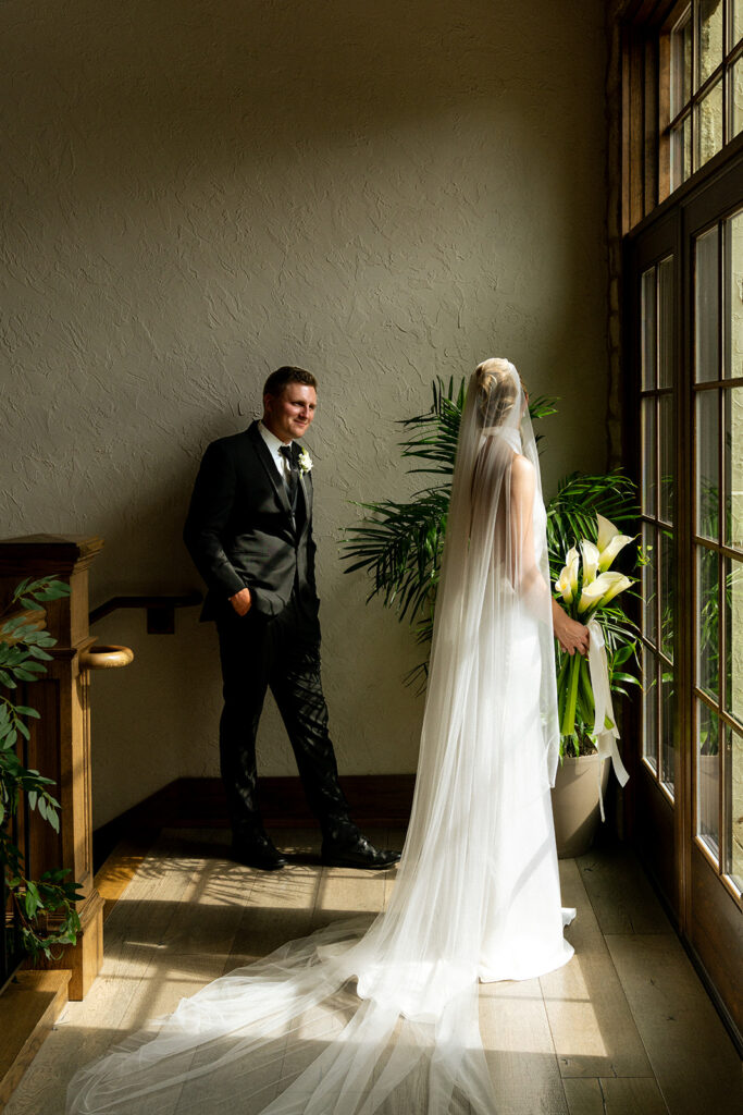 cute picture of the groom looking at the bride