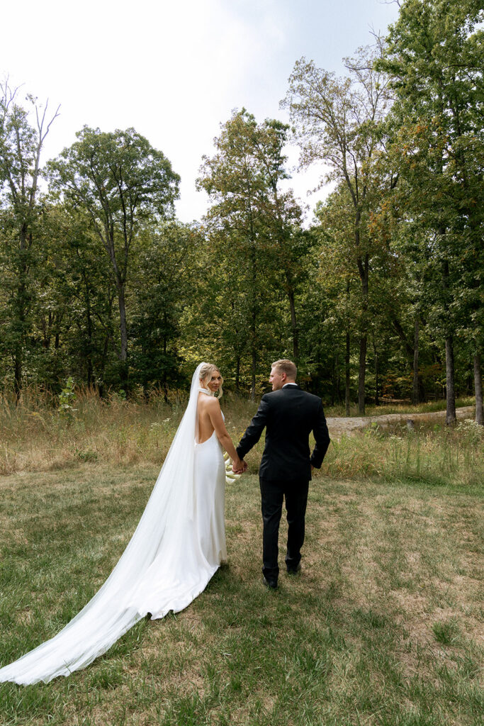 cute portrait of the bride and groom at their stunning wedding venue