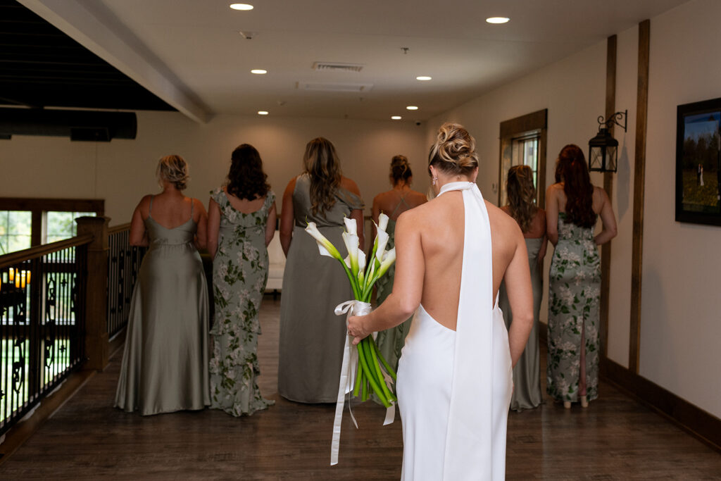 first look of the bride with her bridesmaids