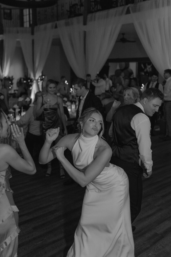 b&w picture of the newlyweds dancing