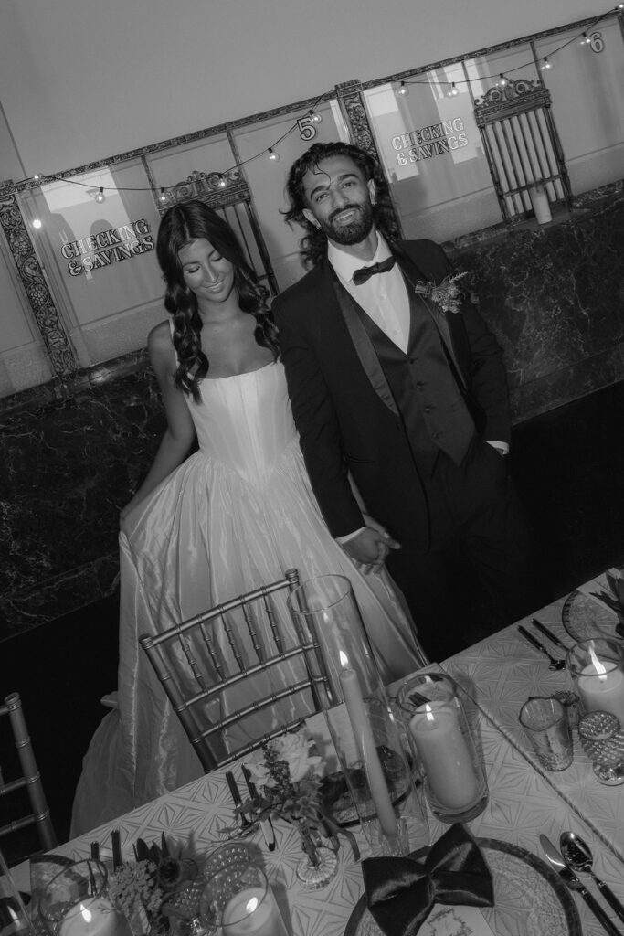 portrait of the bride and groom holding hands