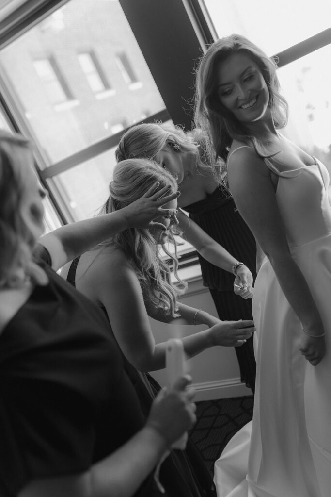 fun picture of the bride getting ready for her ceremony 