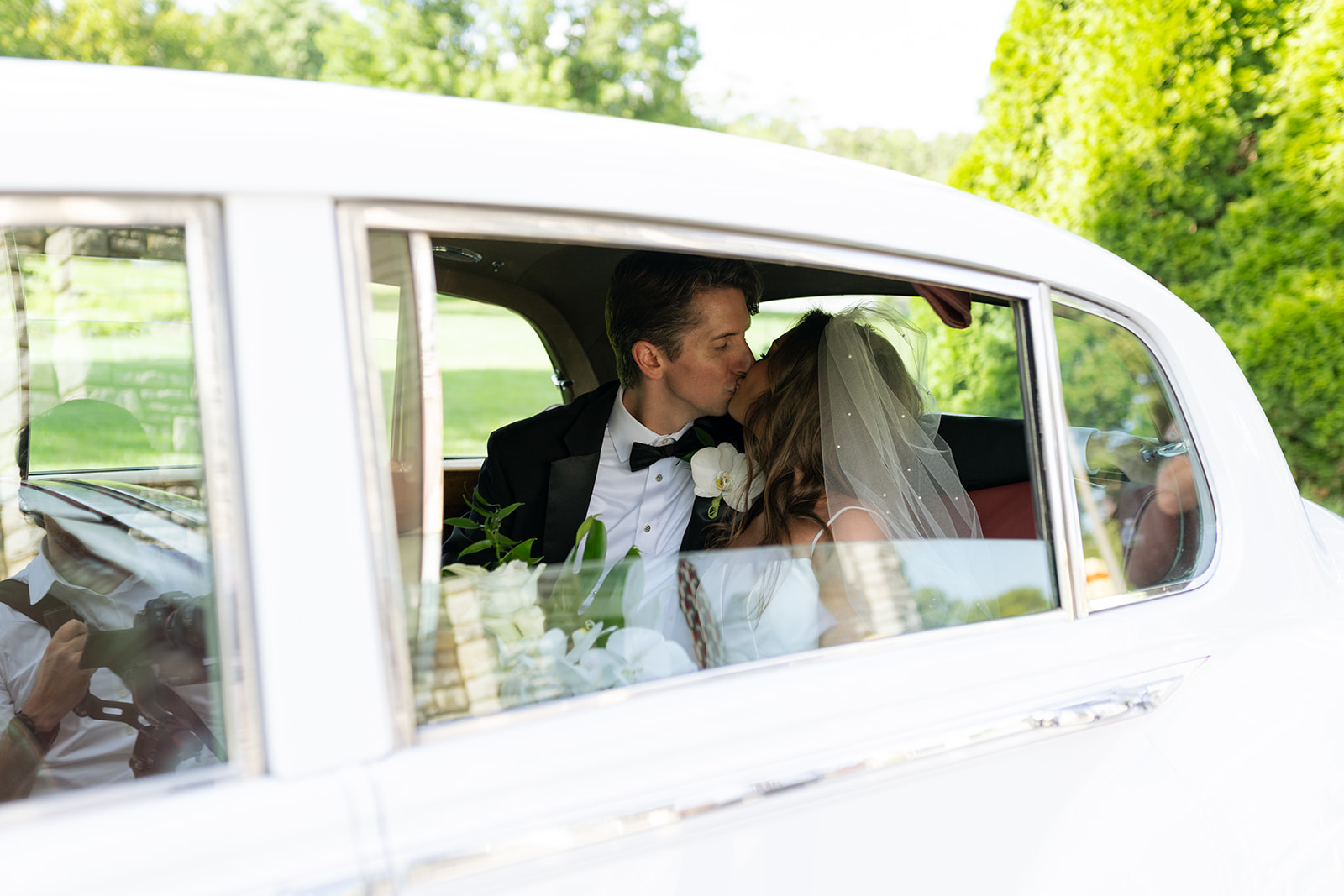 picture of the bride and groom kissing