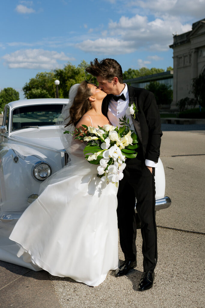 portrait of the bride and groom kissing
