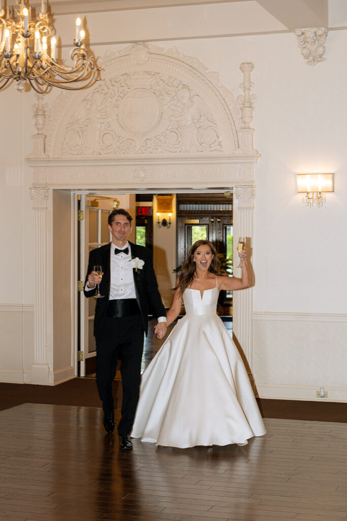cute couple arriving at their reception party