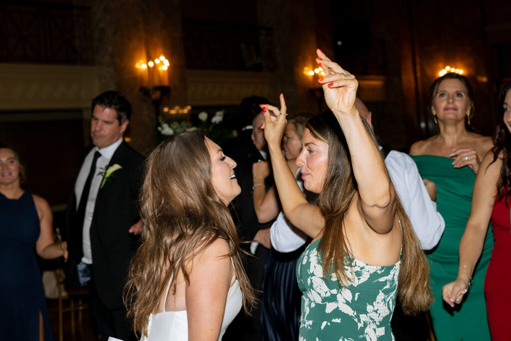 bride and her guests dancing 