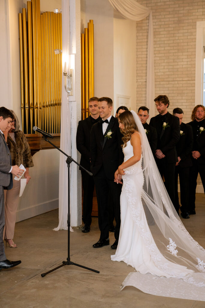 bride and groom at their winter wedding ceremony 