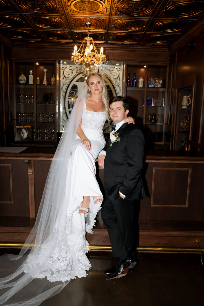 cute picture of the newlyweds posing fro the camera during their bridal portraits 