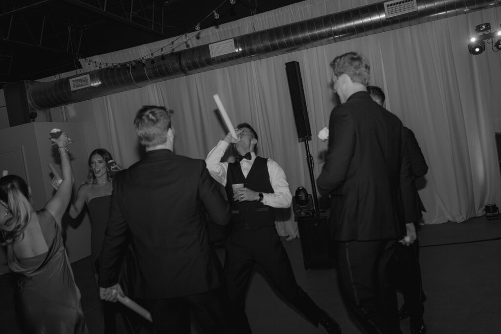 groom dancing at his wedding party