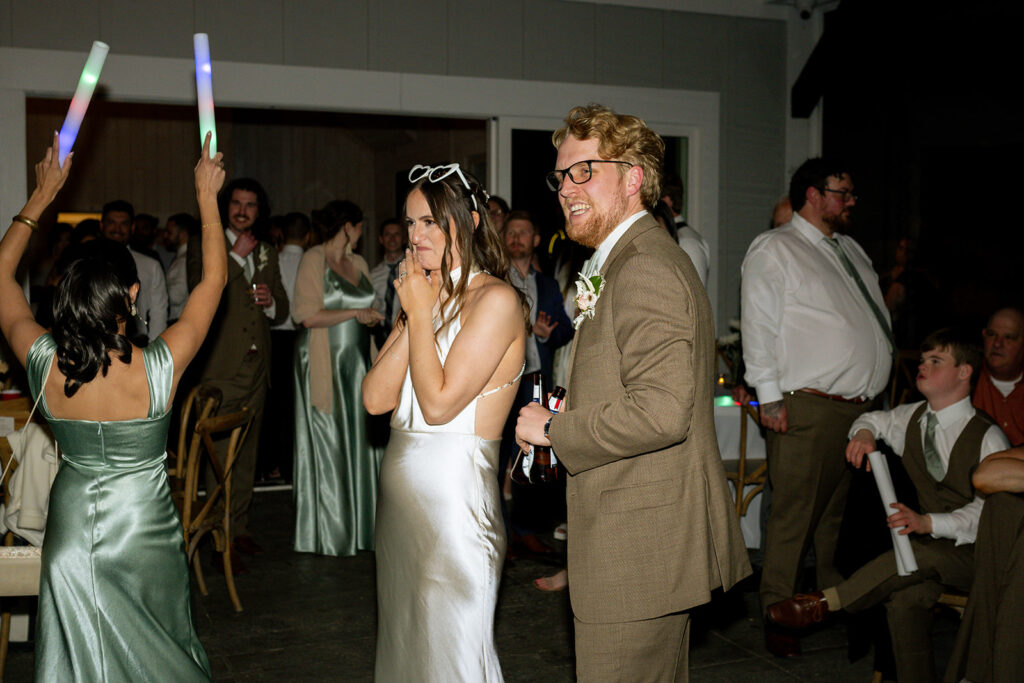 newlyweds having the best time at their dream wedding reception paty
