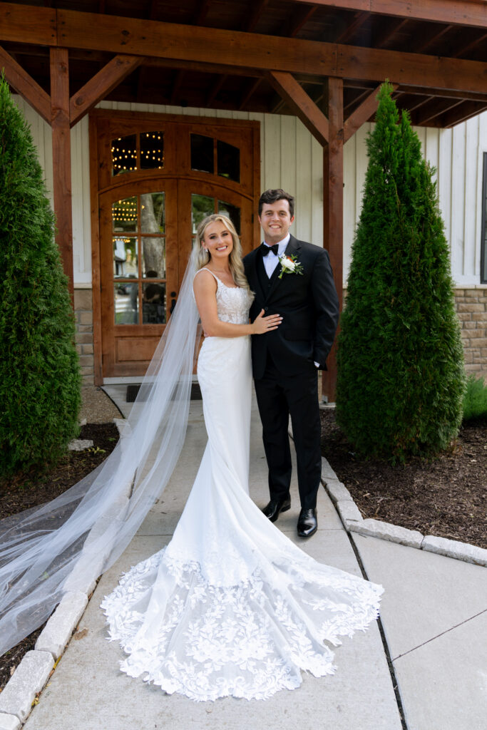 cute picture of the bride and groom at their dream  summer wedding