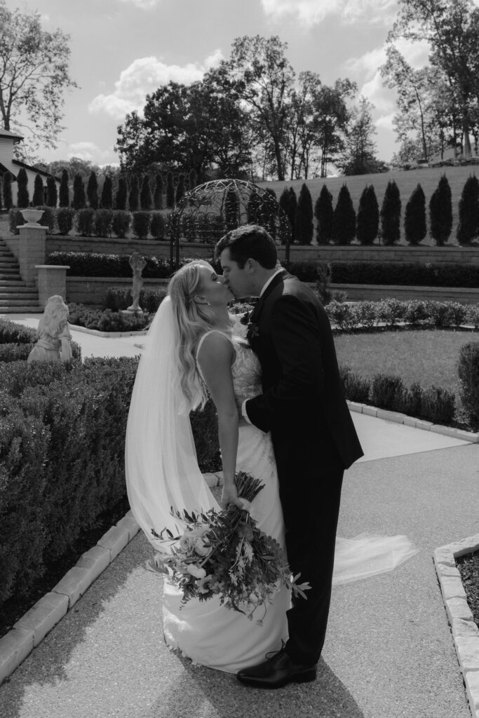 cute picture of the newlyweds kissing