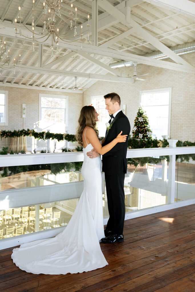 cute picture of the newlyweds looking and smiling at each other