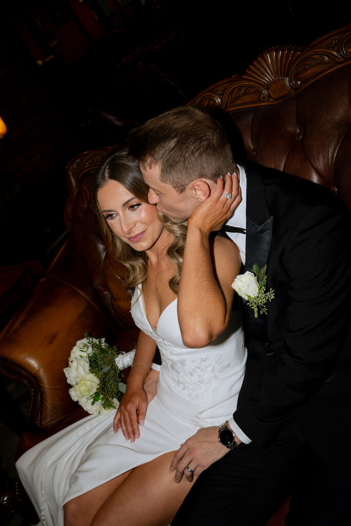 newlyweds hugging after their ceremony
