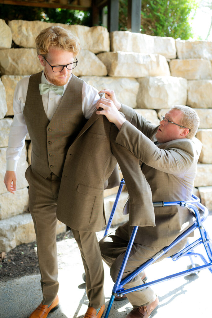 groom getting ready for his first look with the bride