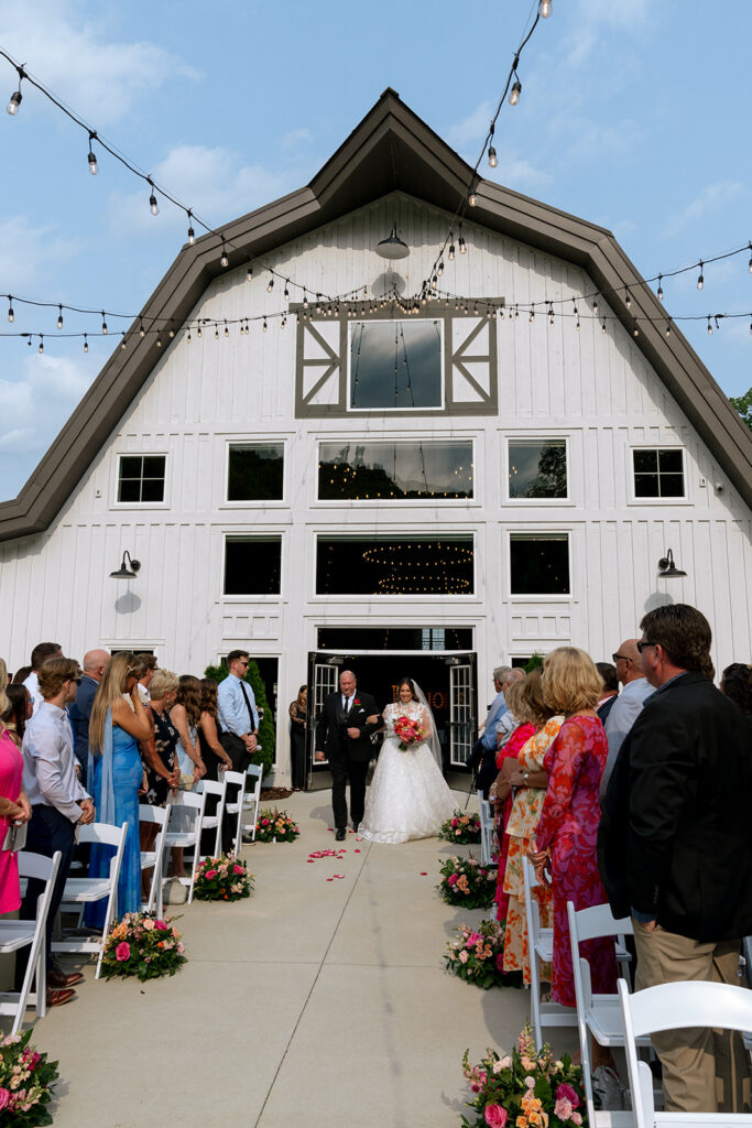 stunning picture of the bride walking down the aisle