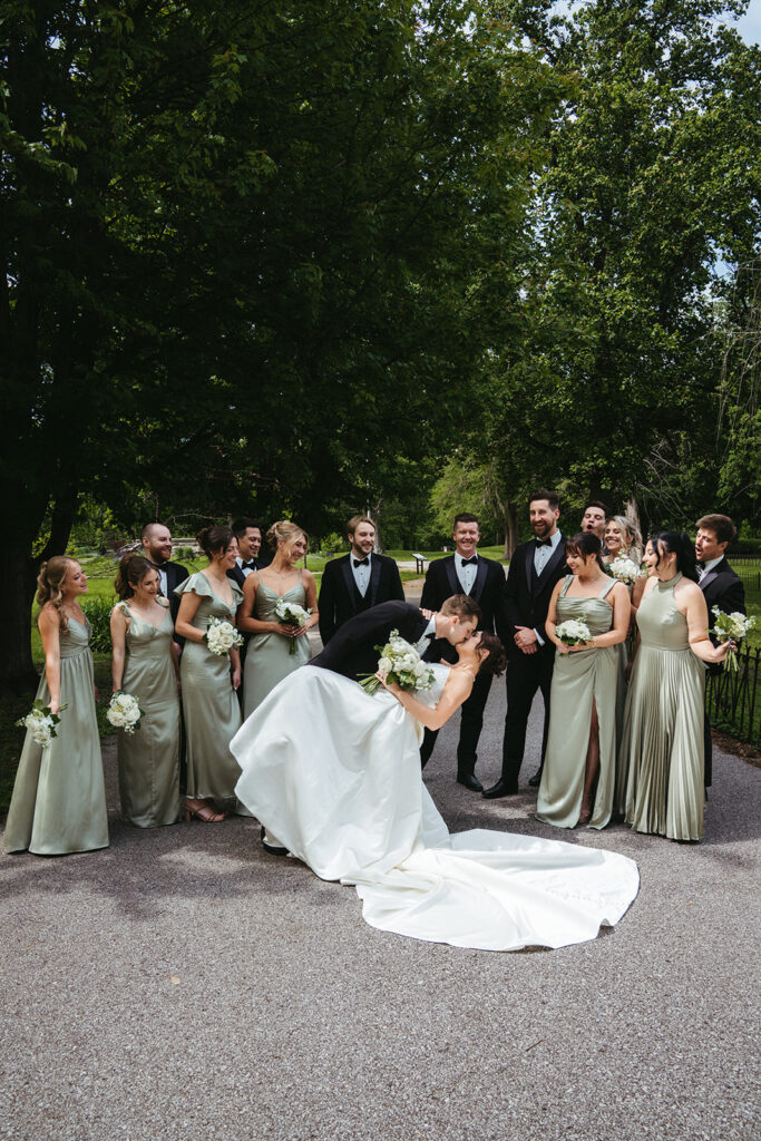 portrait of the bride and groom with their bridal party