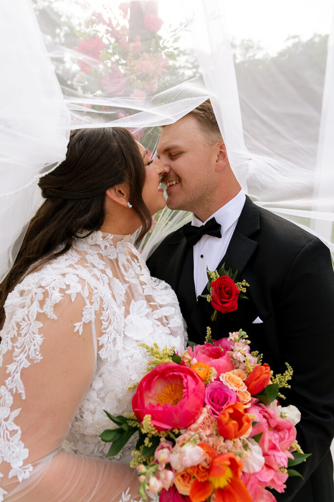 picture of the newlyweds kissing 