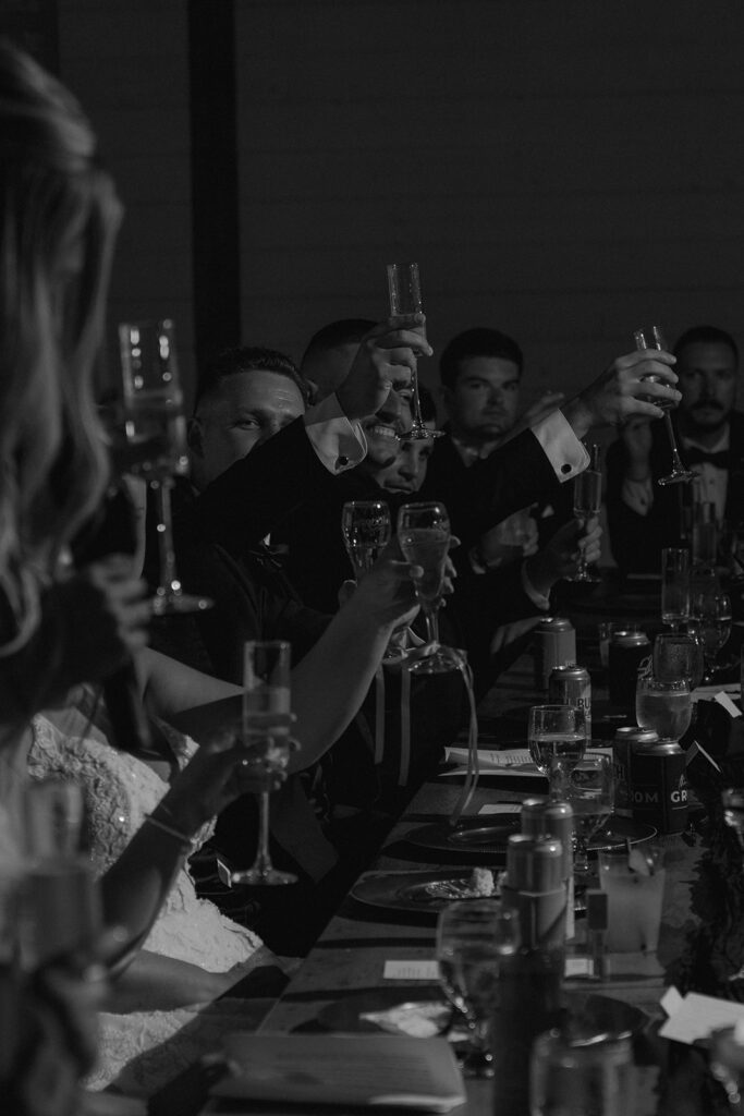 guests celebrating the newlyweds with champagne 