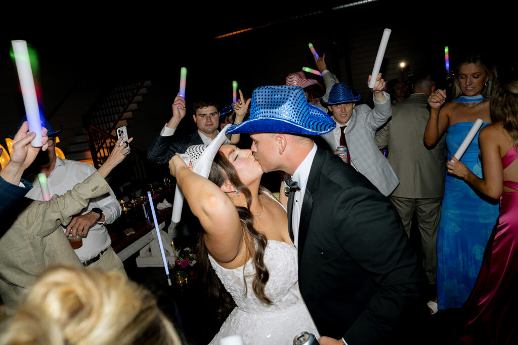cute picture of the newlyweds kissing