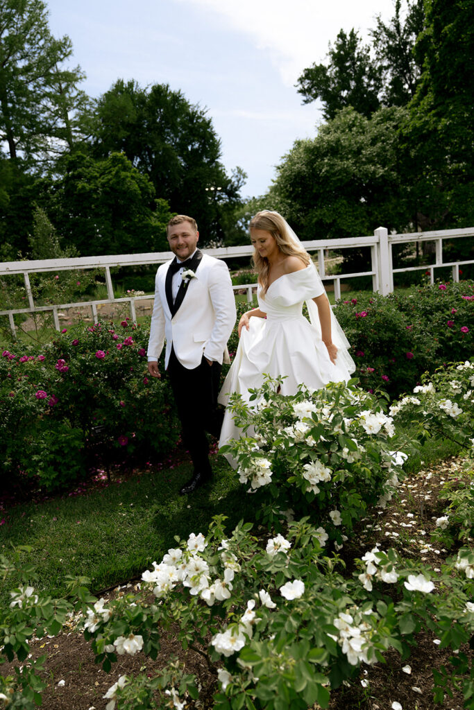 bride and groom walking around their dream wedding venue in st. louis