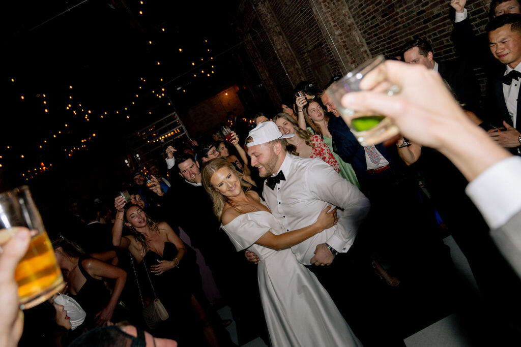 newlyweds dancing at their reception party
