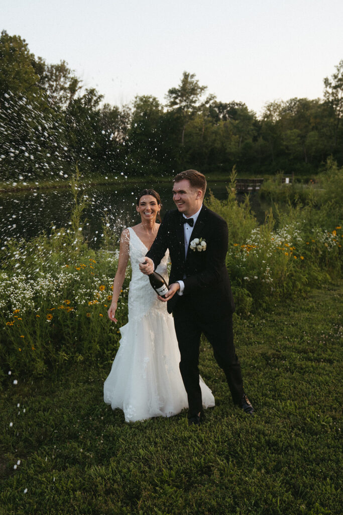 newlyweds celebrating with champagne