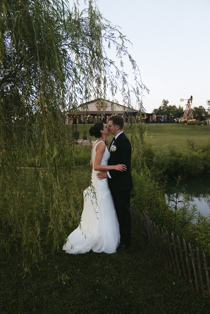 cute picture of the newlyweds kissing