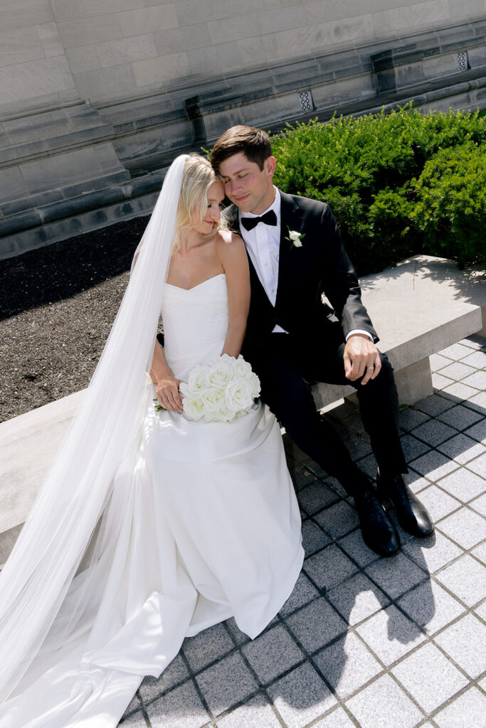 picture of the groom kissing the bride on the cheek