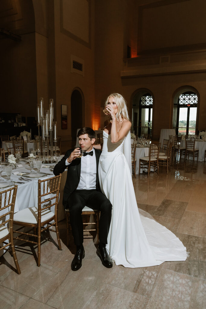 picture of the newlyweds having champagne