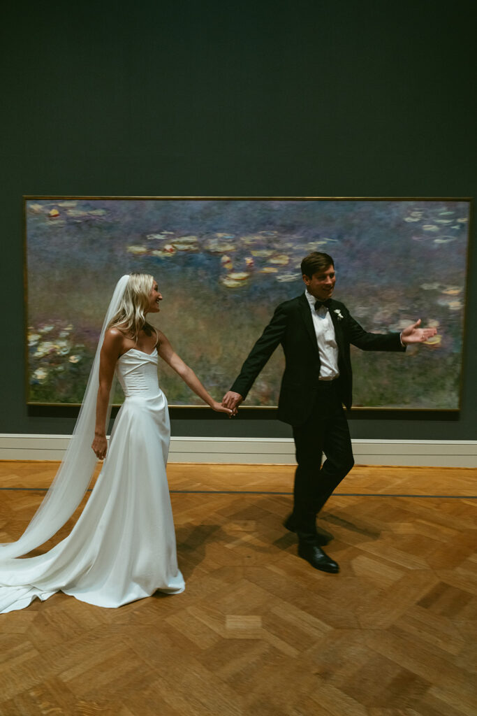 portrait of the newlyweds holding hands