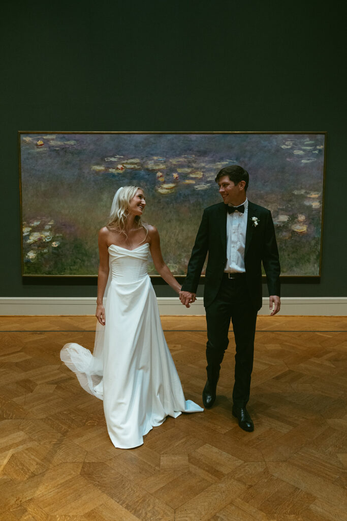 picture of the newly married couple smiling at each other