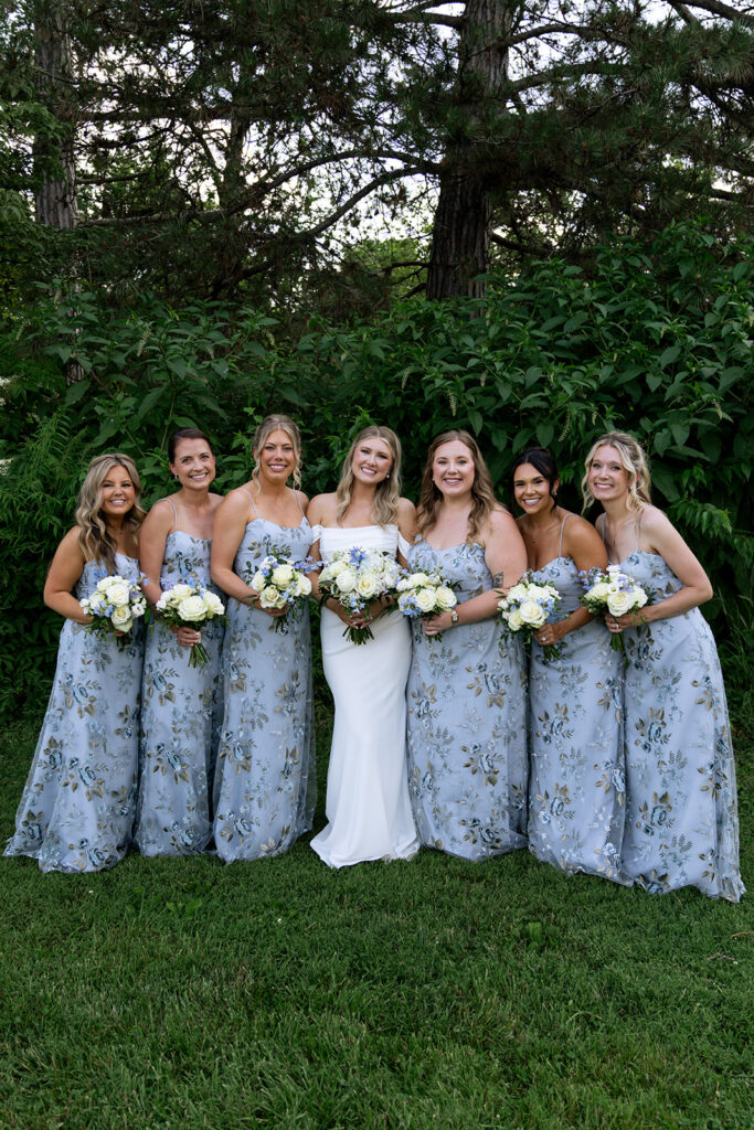 cute picture of the bride and her bridesmaids after the ceremony