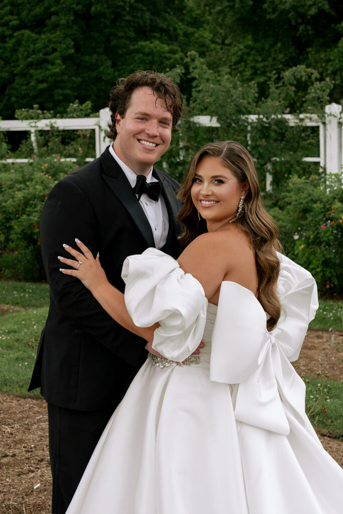 bride and groom posing for the camera during their bridal session
