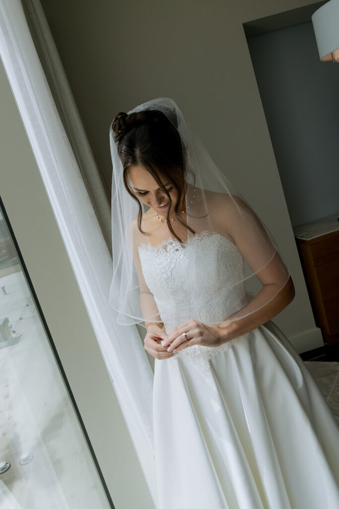 Stunning picture of the bride before her first look with the groom