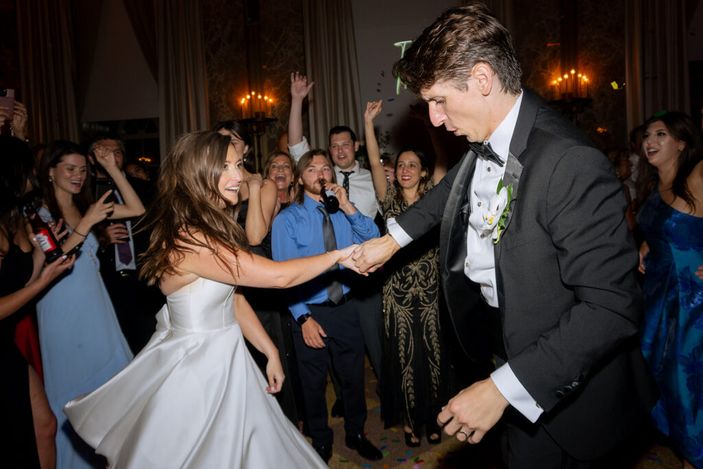 newlyweds dancing at their reception party