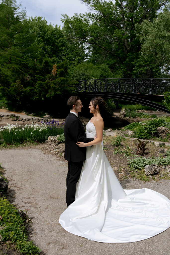 Cute picture of the bride and groom, smiling at each other