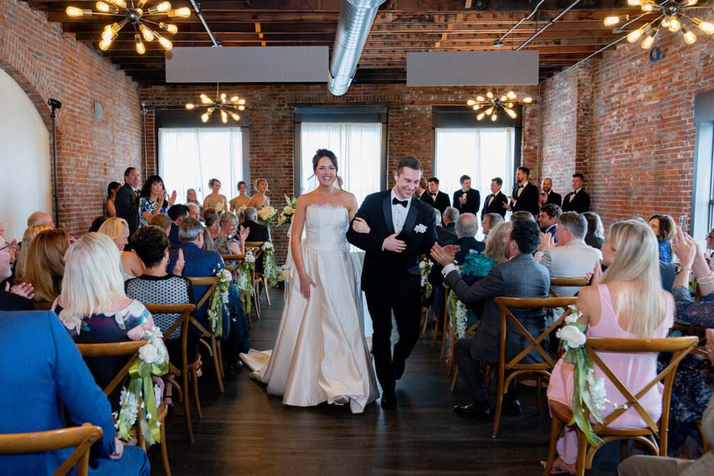 Newlyweds heading to their wedding reception party
